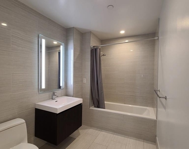 131-05 40th Road - Photo Thumbnail 2