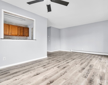 1595 E 2nd Street - Photo Thumbnail 2