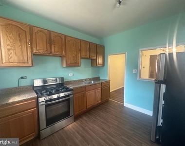 5628 Warrington Avenue - Photo Thumbnail 1