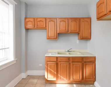 1251 W Rosemont Avenue - Photo Thumbnail 1