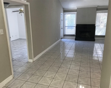 10047 Westpark Drive - Photo Thumbnail 2