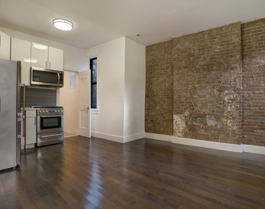 338 West 49th Street - Photo Thumbnail 3