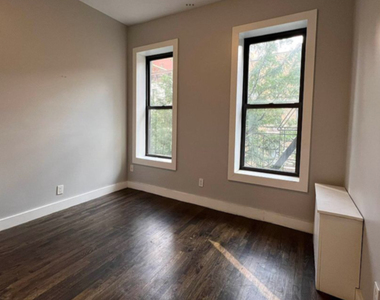338 West 49th Street - Photo Thumbnail 1