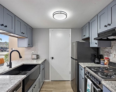 1055 82nd Terrace N - Photo Thumbnail 2
