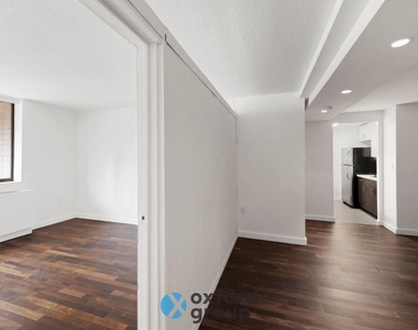 E 33rd St. - Photo Thumbnail 2