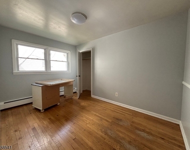 319 E 1st Ave - Photo Thumbnail 2