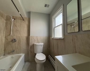 319 E 1st Ave - Photo Thumbnail 7
