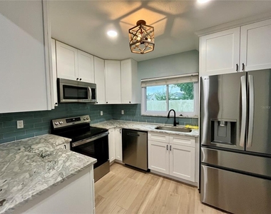8330 Waverly Road N - Photo Thumbnail 4