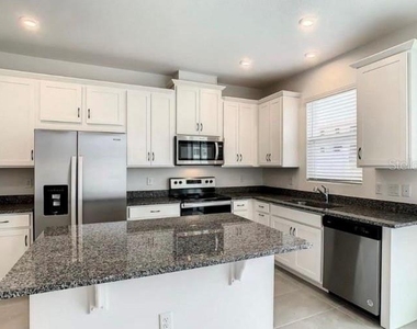 1152 Lakeshore Breeze Place - Photo Thumbnail 7