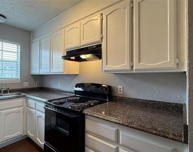 7808 Ashe Court - Photo Thumbnail 2