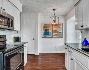 9831 Windy Ridge Road - Photo Thumbnail 17