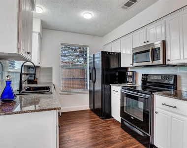 9831 Windy Ridge Road - Photo Thumbnail 14