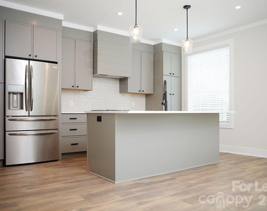1302 E 10th Street - Photo Thumbnail 1