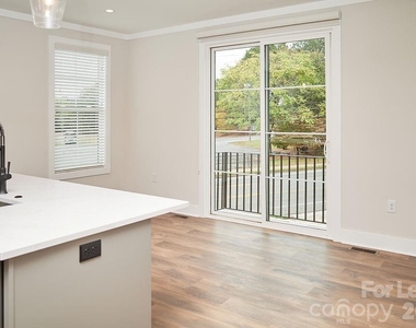 1302 E 10th Street - Photo Thumbnail 5