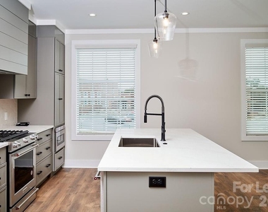 1300 E 10th Street - Photo Thumbnail 1