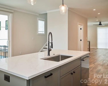 1300 E 10th Street - Photo Thumbnail 3