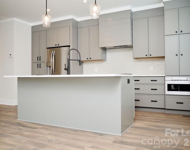 1300 E 10th Street - Photo Thumbnail 2