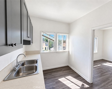 1163 E 46th - Photo Thumbnail 2