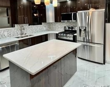 9911 Ascan Avenue - Photo Thumbnail 4