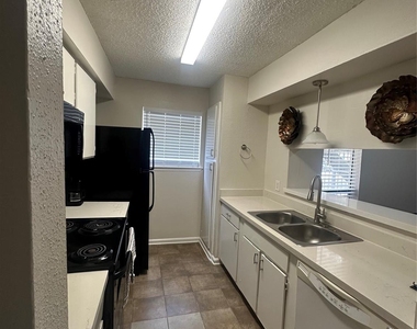 6601 Sands Point Drive - Photo Thumbnail 1