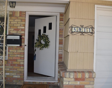 5911 Hornwood Drive - Photo Thumbnail 2