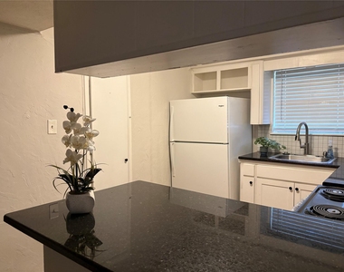 1209 N Roberson Street - Photo Thumbnail 1