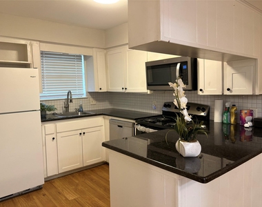 1209 N Roberson Street - Photo Thumbnail 6