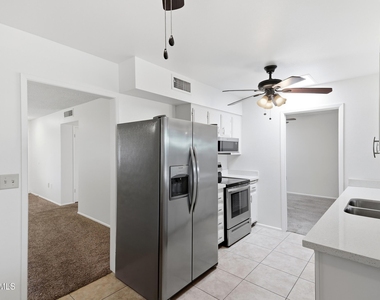 10922 W Santa Fe Drive - Photo Thumbnail 7