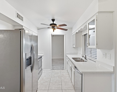 10922 W Santa Fe Drive - Photo Thumbnail 9