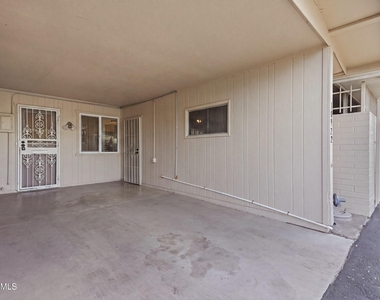10922 W Santa Fe Drive - Photo Thumbnail 23