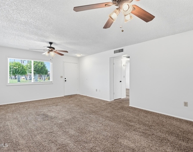 10922 W Santa Fe Drive - Photo Thumbnail 4