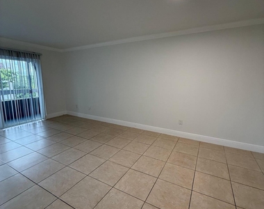 7732 Camino Real - Photo Thumbnail 4