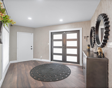6106 Royal Poinciana Lane - Photo Thumbnail 1