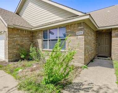 8915 Wild Rose Lane - Photo Thumbnail 3