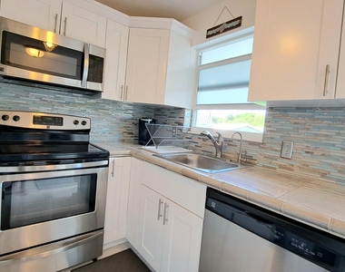1445 Se 15th Court - Photo Thumbnail 2