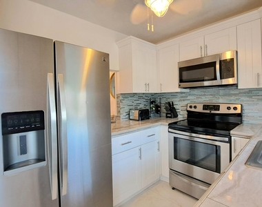 1445 Se 15th Court - Photo Thumbnail 1