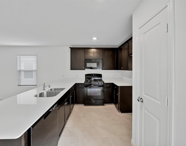7765 Ruellia Road - Photo Thumbnail 15