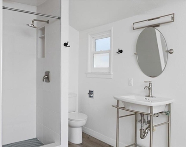 1923 S Tremont Street - Photo Thumbnail 24