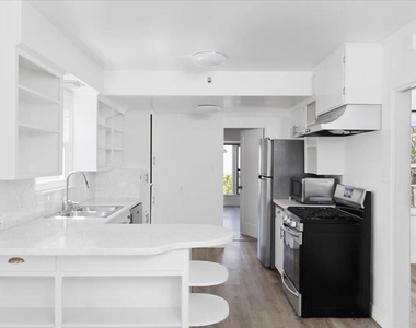 1923 S Tremont Street - Photo Thumbnail 12