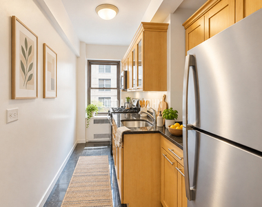 E 56TH ST  - Photo Thumbnail 1