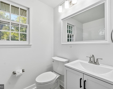8009 Gosport Lane - Photo Thumbnail 8