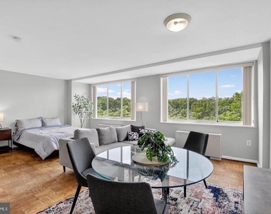 10401 Grosvenor Place - Photo Thumbnail 2