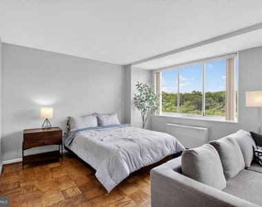 10401 Grosvenor Place - Photo Thumbnail 3