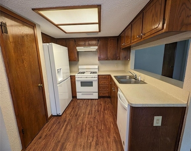 5614 Wagon Train Rd - Photo Thumbnail 2