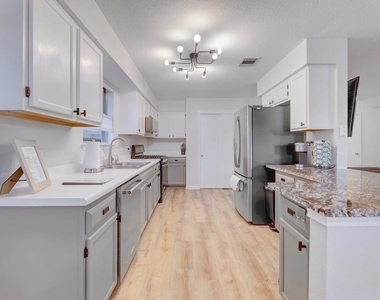 1205 Forest Oaks Path - Photo Thumbnail 8