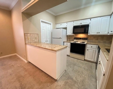 1307 Kinney Ave - Photo Thumbnail 7