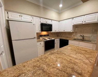 1307 Kinney Ave - Photo Thumbnail 8