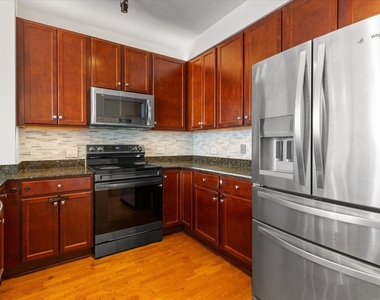 100 E 14th Street - Photo Thumbnail 10