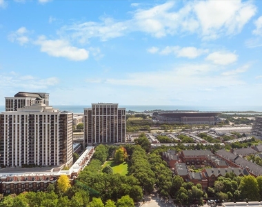 100 E 14th Street - Photo Thumbnail 2