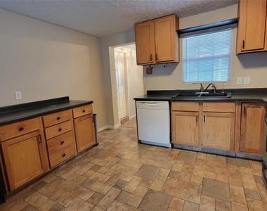 4415 Mckinney Street - Photo Thumbnail 3